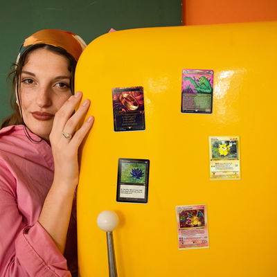 Ceramic TCG card magnets on a retro fridge